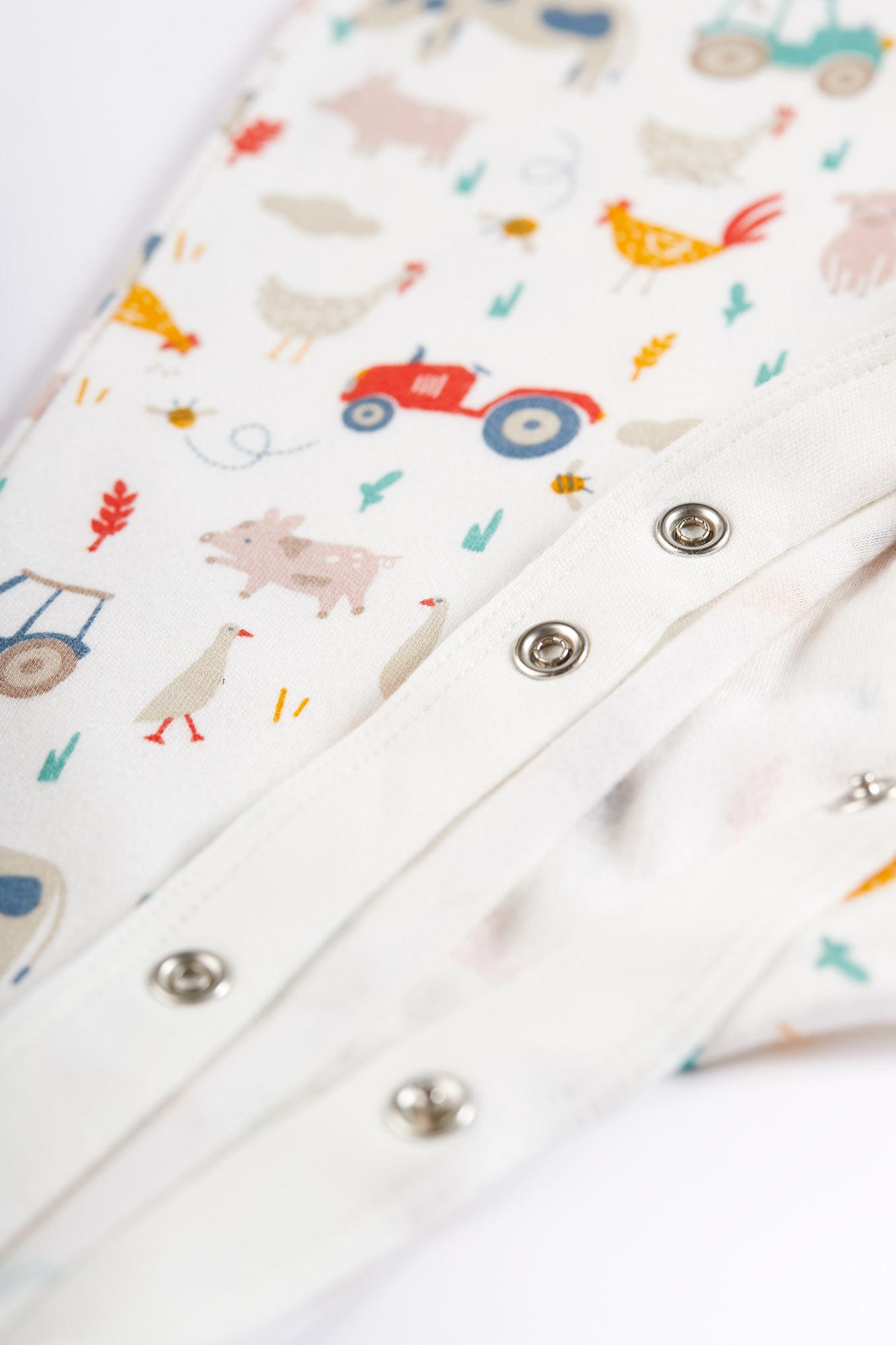 frugi lovely babygrow with farmyard print at whippersnappers online