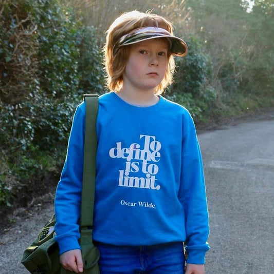 blue sweatshirt with to define is to limit logo on the front