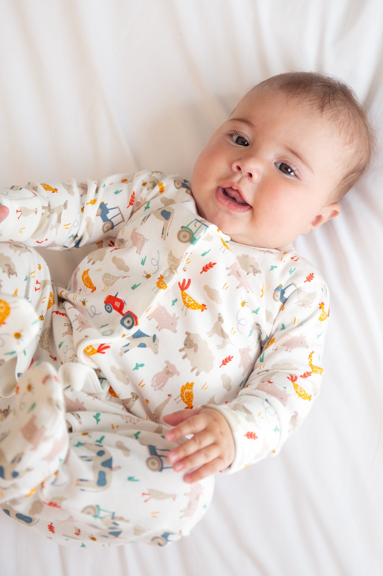 frugi lovely babygrow with farmyard print at whippersnappers online