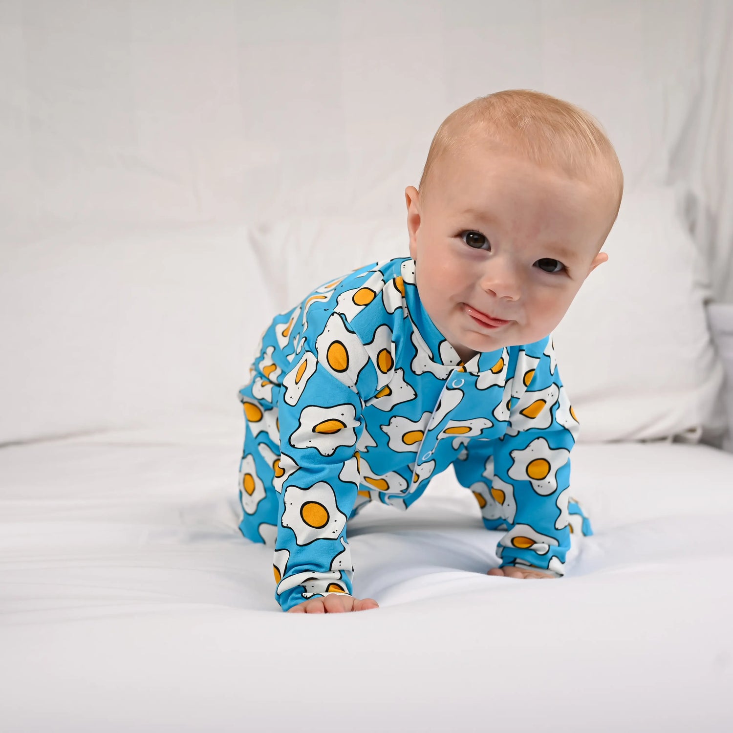fred and noah eggies print cotton baby sleepsuit with eggy print at whippersnappers online