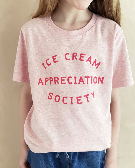 GIRL WEARING PINK ICE CREAM APPRECIATION SOCIETY LOGO TEE AT WHIPPERSNAPPERS ONLINE