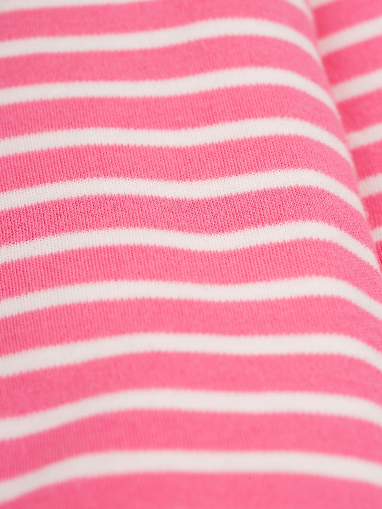 pink & white striped romper suit with bunny applique on the front by frugi at whippersnappersonline
