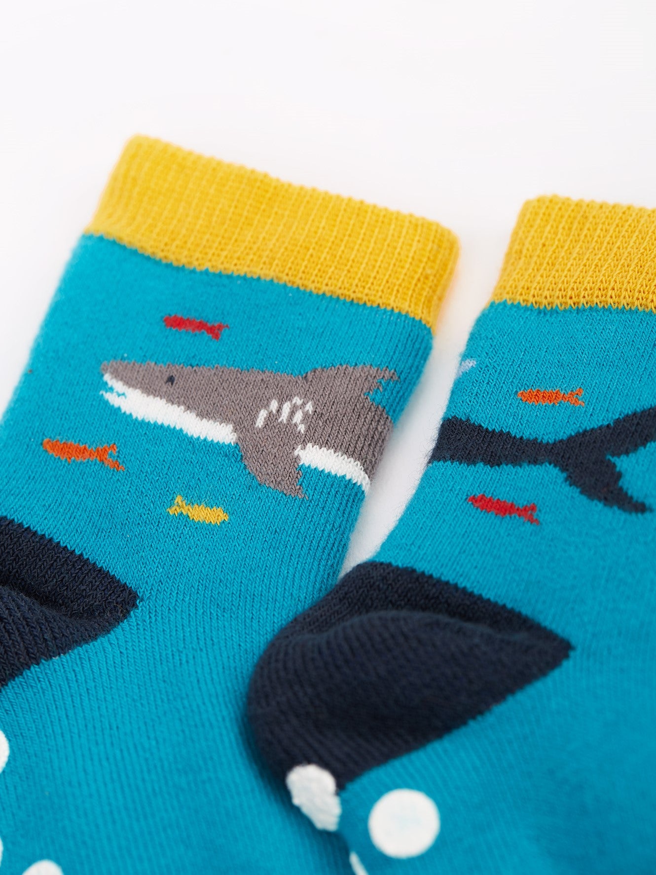 frugi grippy socks in whale and dino designs