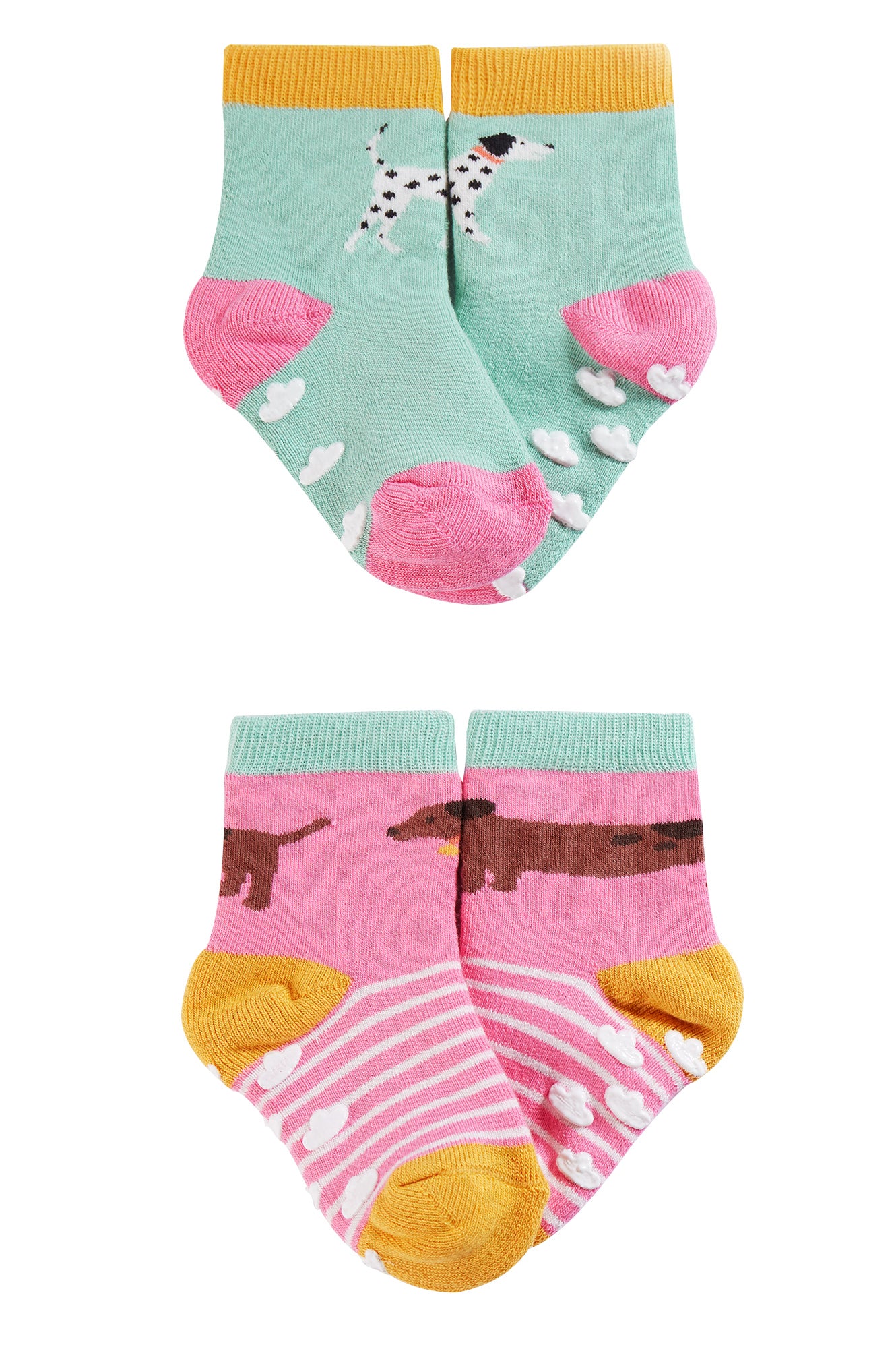frugi grippy socks in pastel colours and fun dog designs