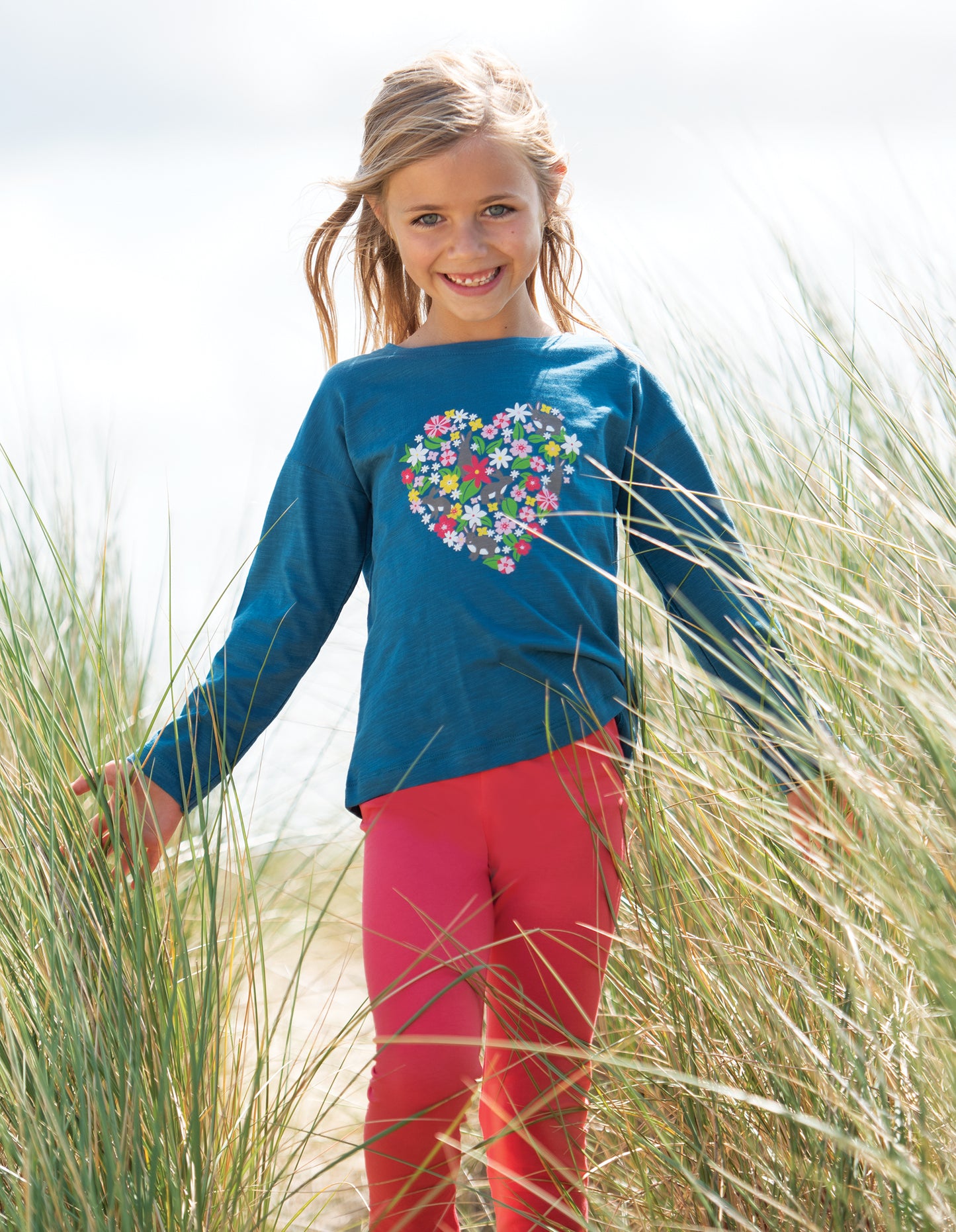 Frugi Libby leggings in watermelon colour. Made from organic cotton.