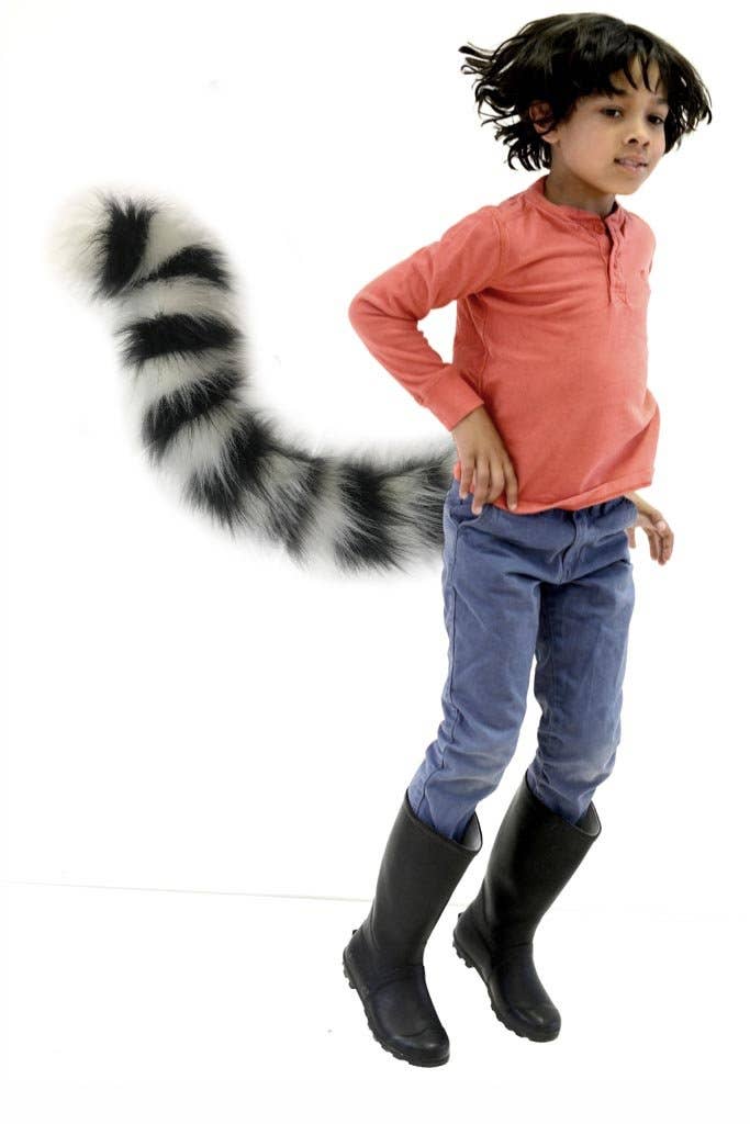 fluffy lemur dressing up tail