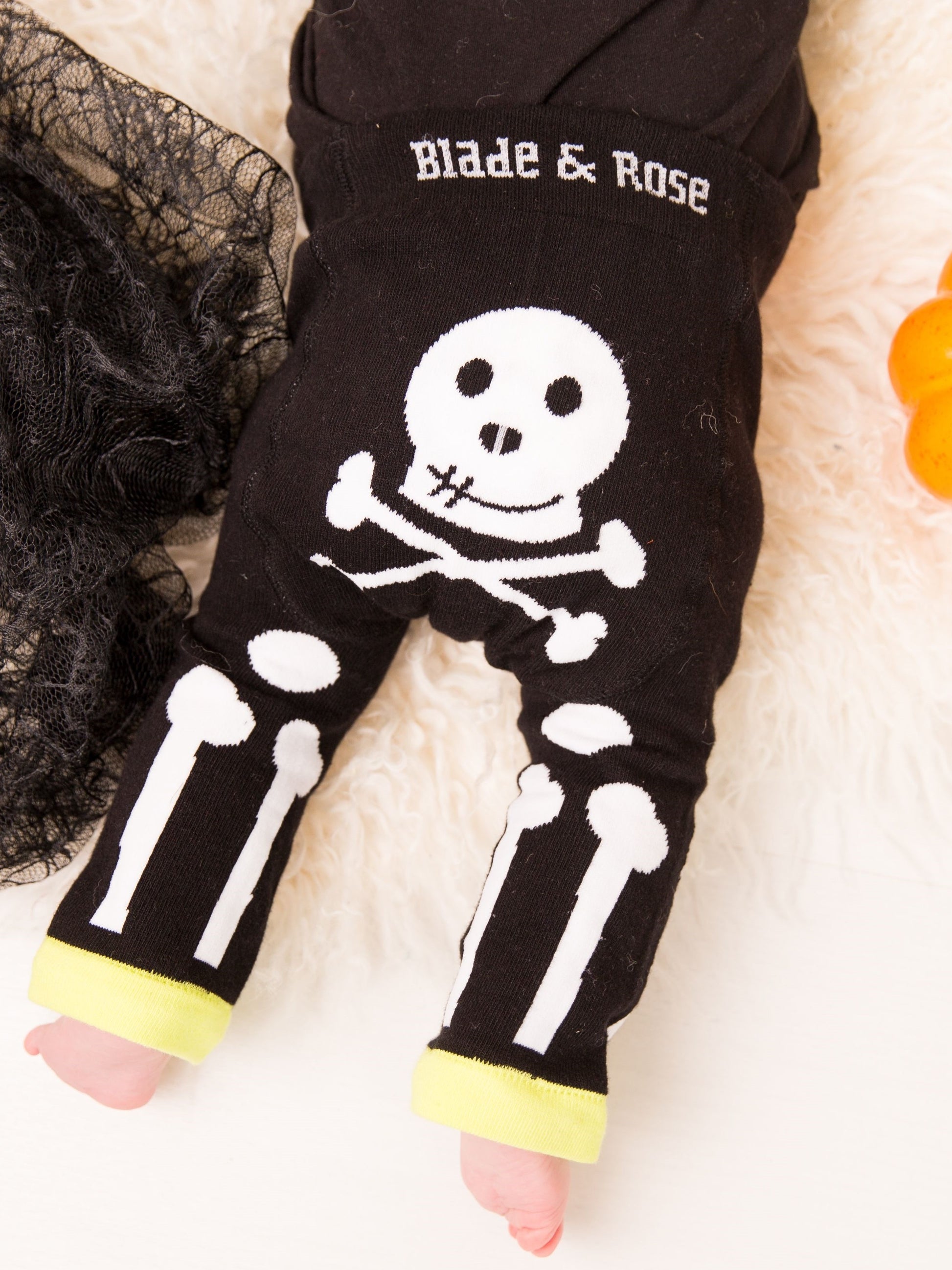 blade and rose skeleton leggings
