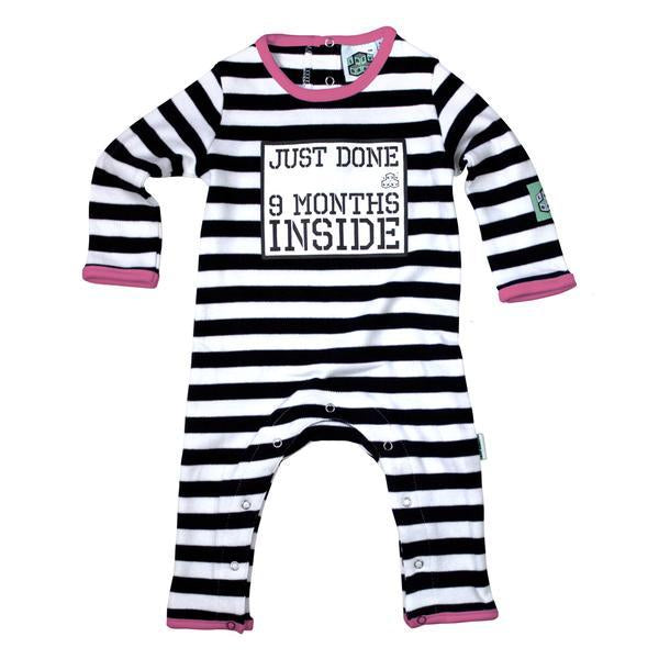 Lazy Baby black & white striped babygrow with just done 9 months inside slogan and hot pink trim