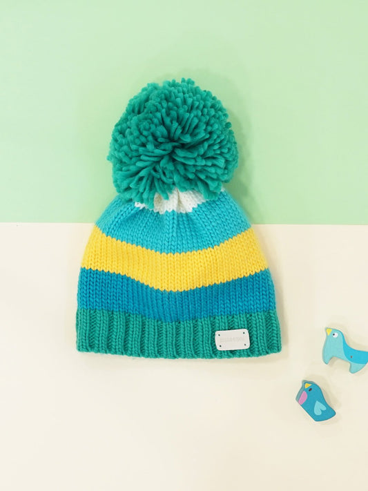 blue green and mustard knitted bobble hat with pom pom