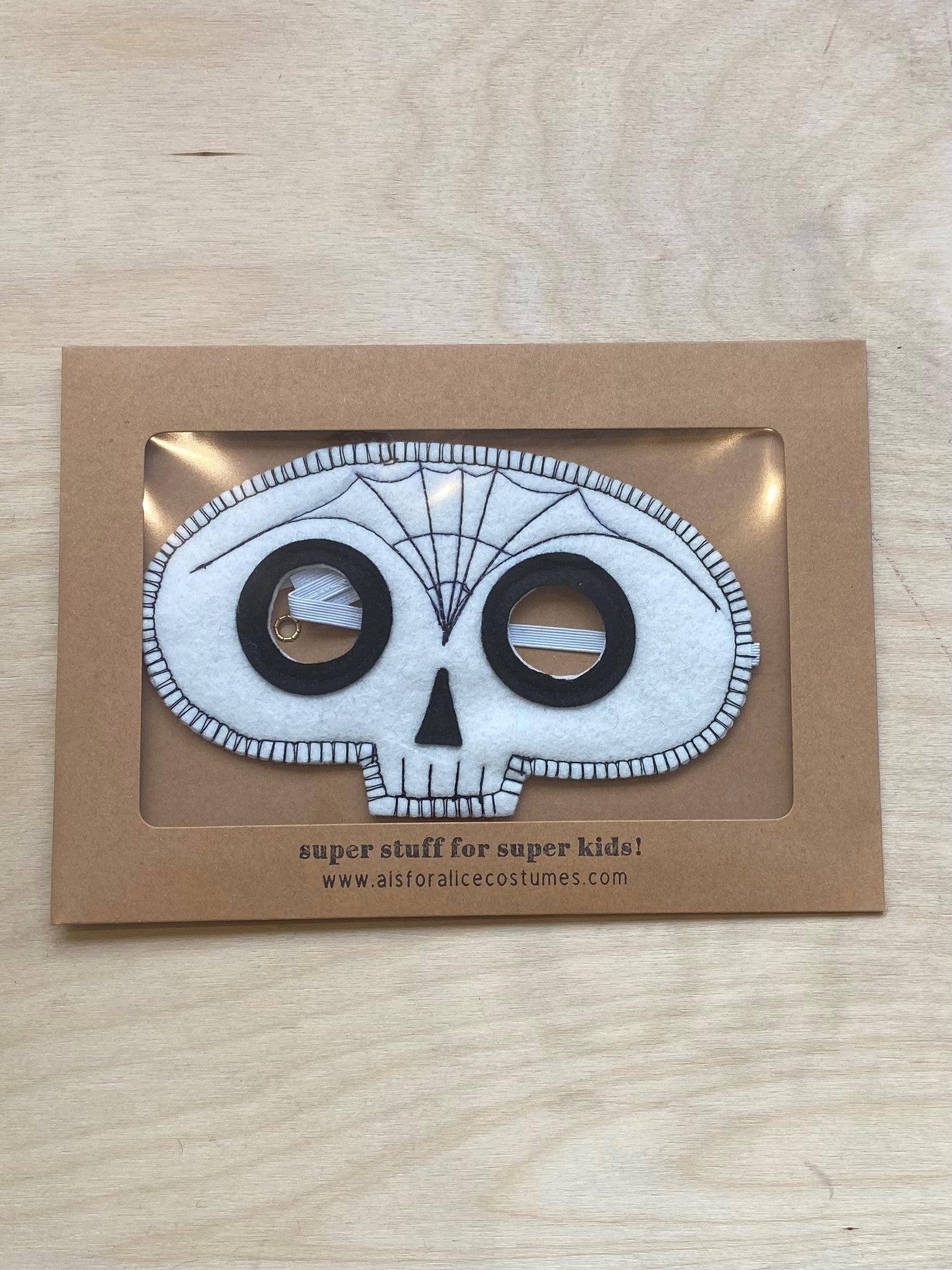 a is for alice skull mask packaging